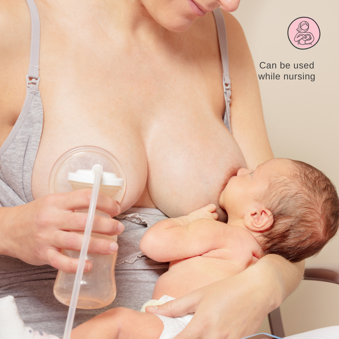 Mother pumping while breastfeeding