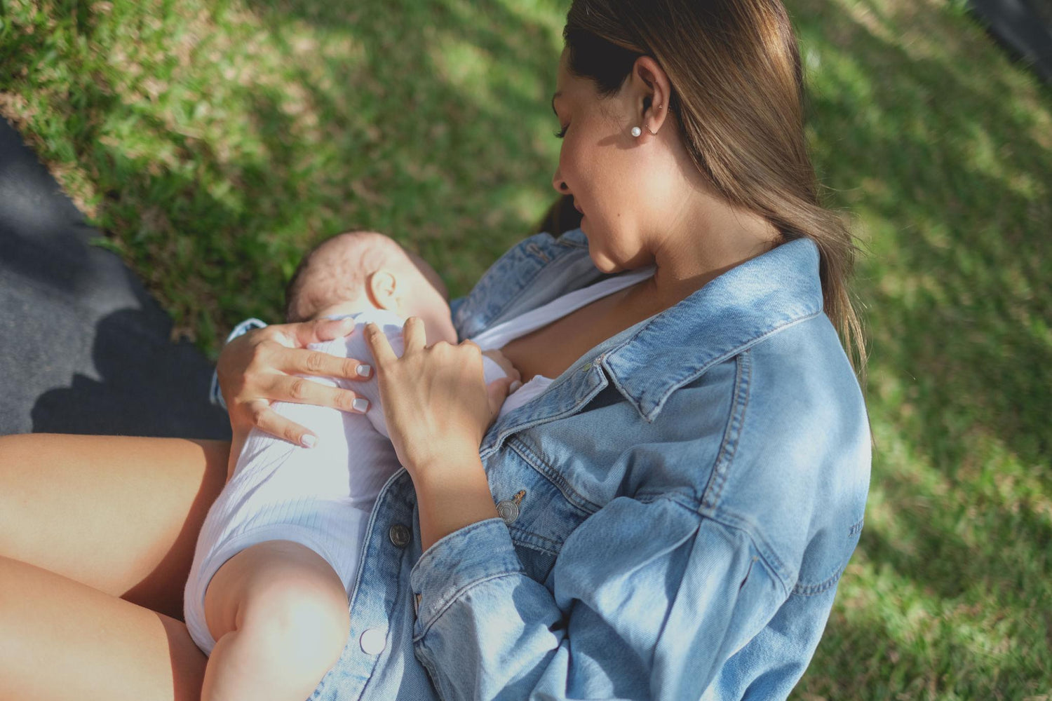 mother breastfeeding outdoors