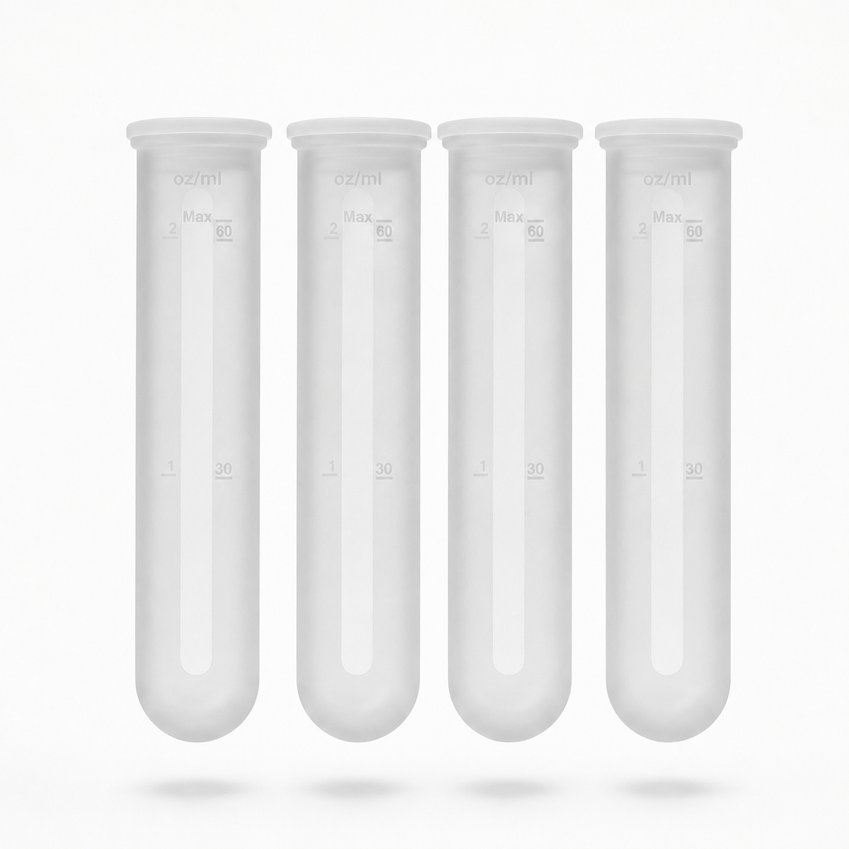 Four translucent white silicone test tubes with measurement markings, arranged in a row on a clean white background.